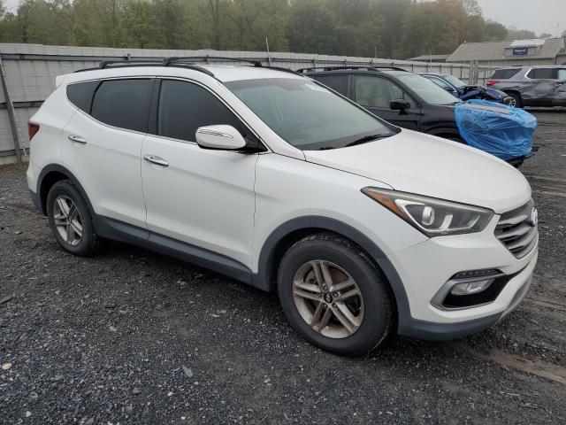 5NMZU3LB4HH015171 - 2017 HYUNDAI SANTA FE S WHITE photo 4