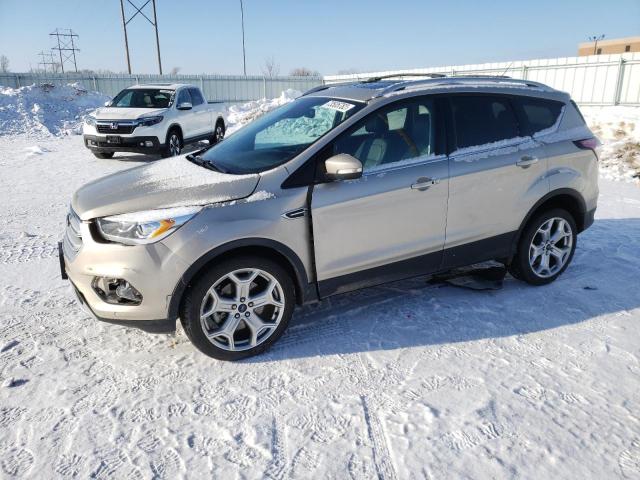 1FMCU9J93HUC79866 - 2017 FORD ESCAPE TITANIUM GOLD photo 1