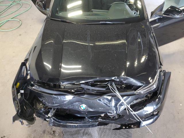 WBA73AK05P7M91141 - 2023 BMW 228XI Սև լուսանկար 11