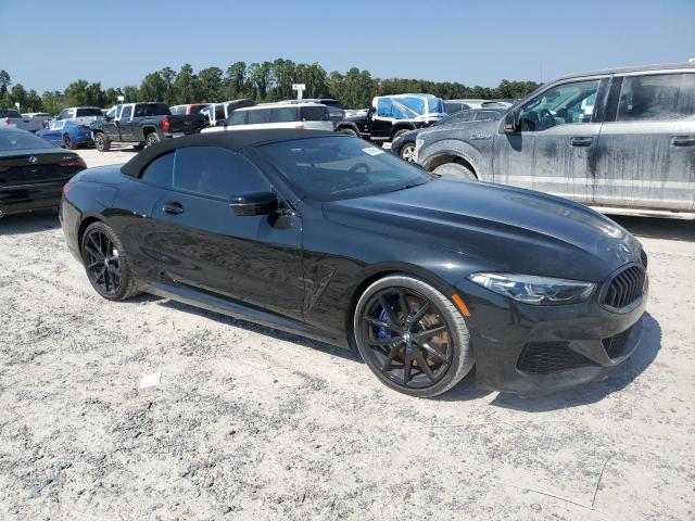 WBAFY4C05NCJ72646 - 2022 BMW M850XI BLACK photo 4