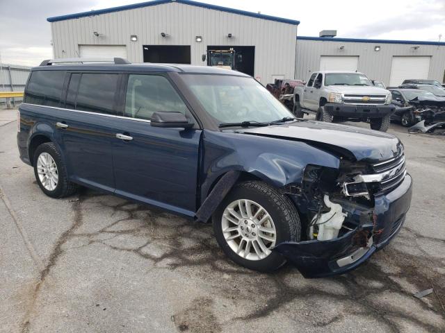 2FMHK6C83HBA09511 - 2017 FORD FLEX SEL BLUE photo 4