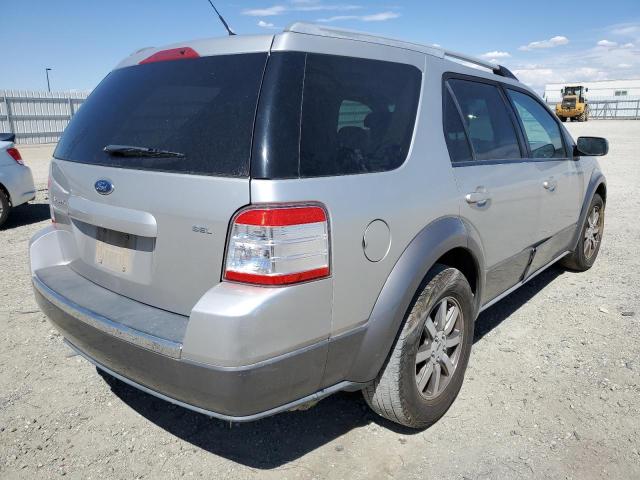 1FMDK02W78GA17048 - 2008 FORD TAURUS X SEL SILVER photo 4