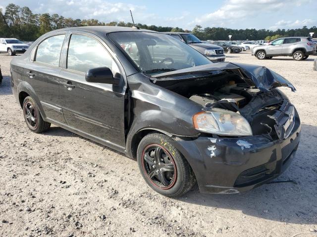 KL1TD5DE0BB161290 - 2011 CHEVROLET AVEO LS BLACK photo 4