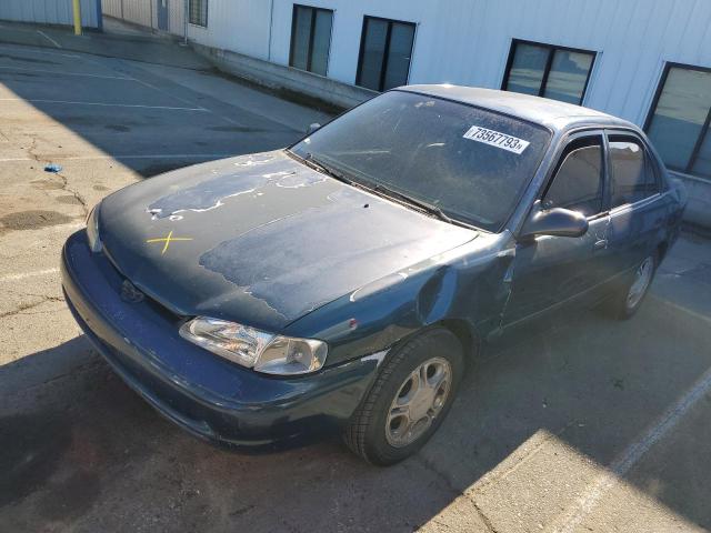 1Y1SK5285YZ415756 - 2000 CHEVROLET GEO PRIZM BASE GREEN photo 1