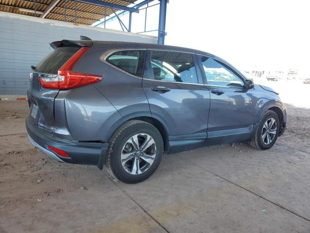 2HKRW5H32JH402608 - 2018 HONDA CR-V LX SILVER photo 3