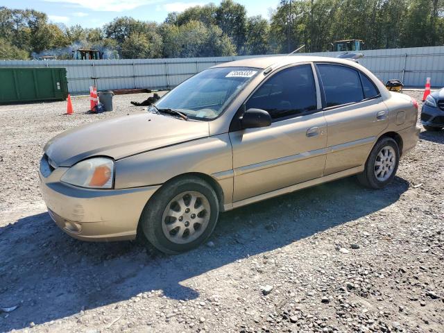 KNADC125946331067 - 2004 KIA RIO GOLD photo 1