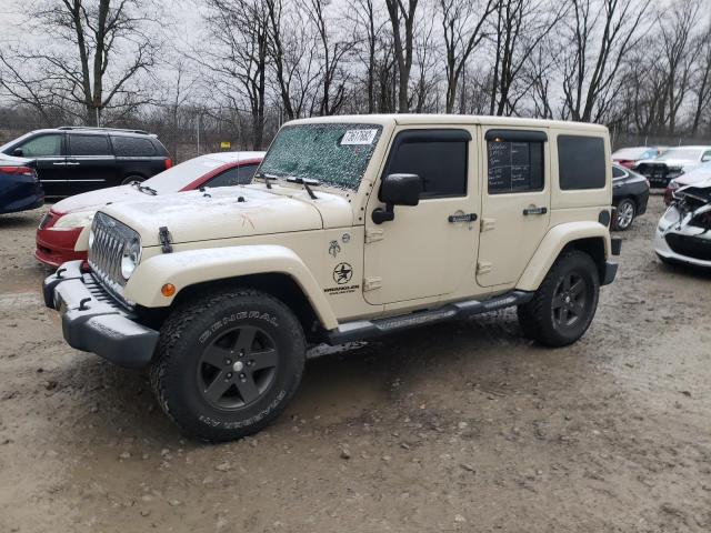 1J4BA3H12BL615570 - 2011 JEEP WRANGLER U SPORT TAN photo 1