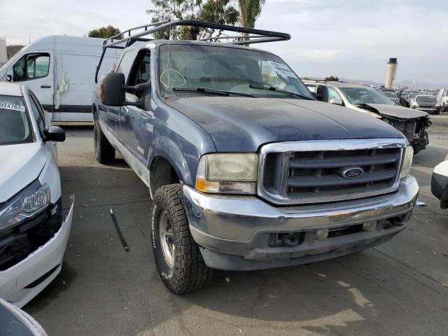 1FTSW31P84ED55723 - 2004 FORD F350 SRW SUPER DUTY BLUE photo 4