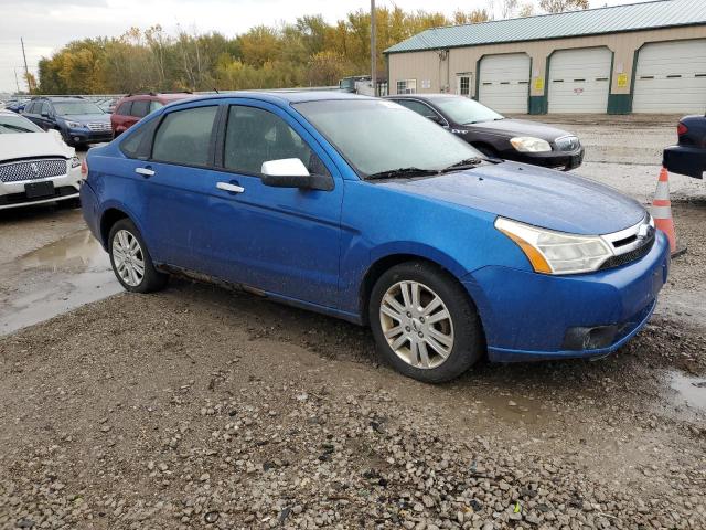 1FAHP3HN5AW127301 - 2010 FORD FOCUS SEL BLUE photo 4