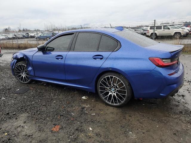 3MW5R7J01N8C32815 - 2022 BMW 330XI BLUE photo 2