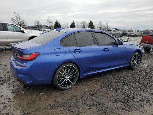 3MW5R7J01N8C32815 - 2022 BMW 330XI BLUE photo 3