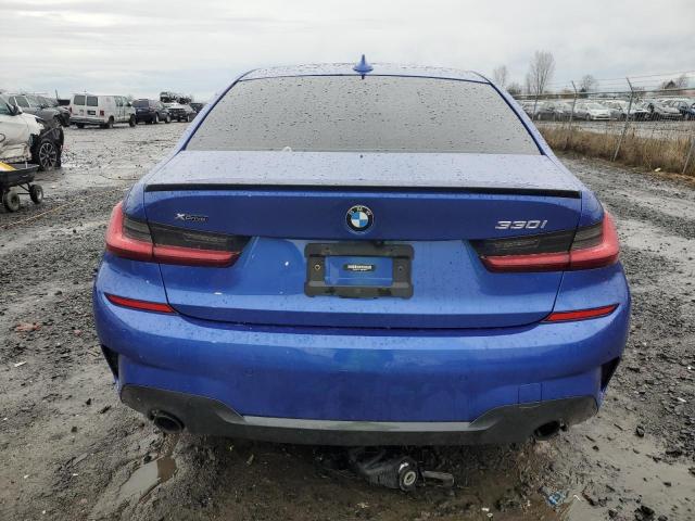 3MW5R7J01N8C32815 - 2022 BMW 330XI BLUE photo 6