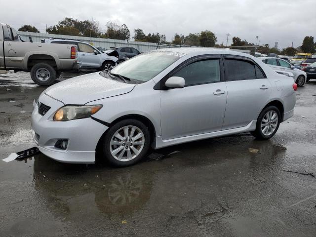 1NXBU40E99Z103919 - 2009 TOYOTA COROLLA BASE SILVER photo 1