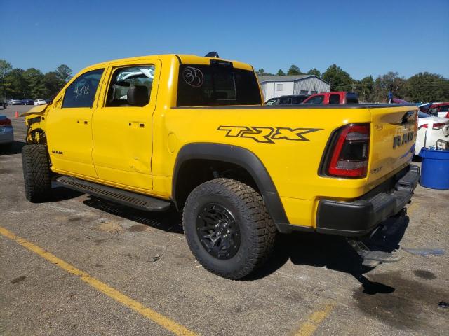 1C6SRFU94PN575409 - 2023 RAM 1500 TRX YELLOW photo 2