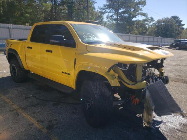 1C6SRFU94PN575409 - 2023 RAM 1500 TRX YELLOW photo 4