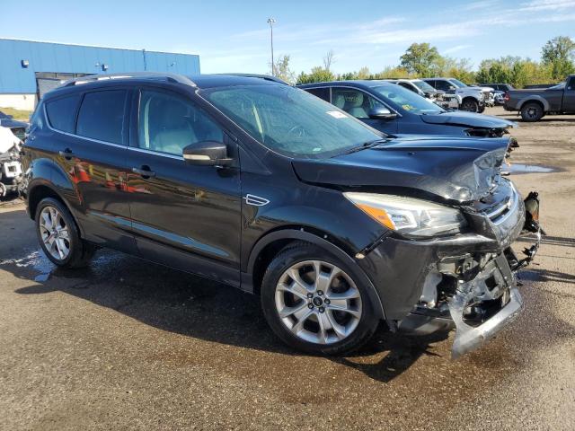 1FMCU0J91FUC41898 - 2015 FORD ESCAPE TITANIUM BLACK photo 4