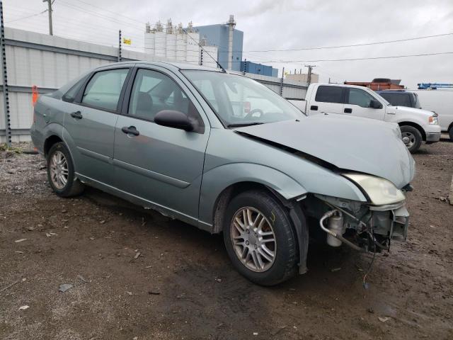 1FAFP34N25W146973 - 2005 FORD FOCUS ZX4 WHITE photo 4