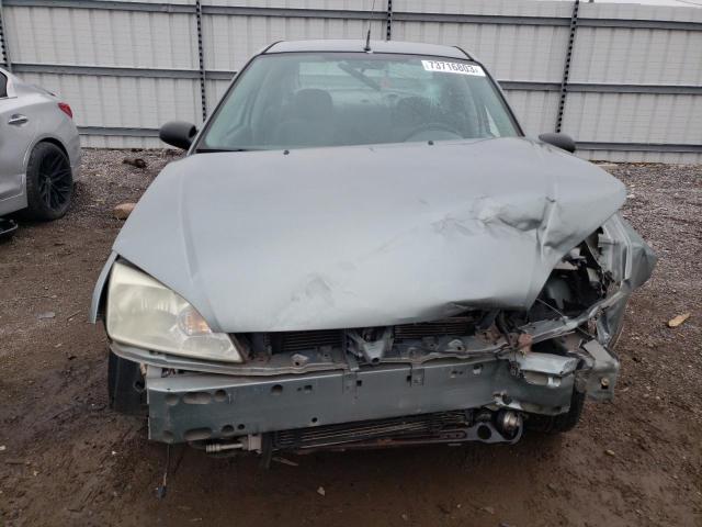 1FAFP34N25W146973 - 2005 FORD FOCUS ZX4 WHITE photo 5