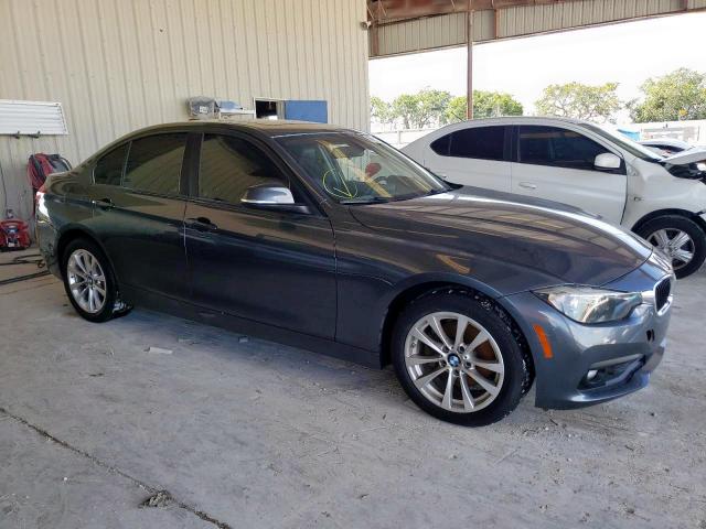 WBA8E5G33HNU42901 - 2017 BMW 320 XI GRAY photo 1