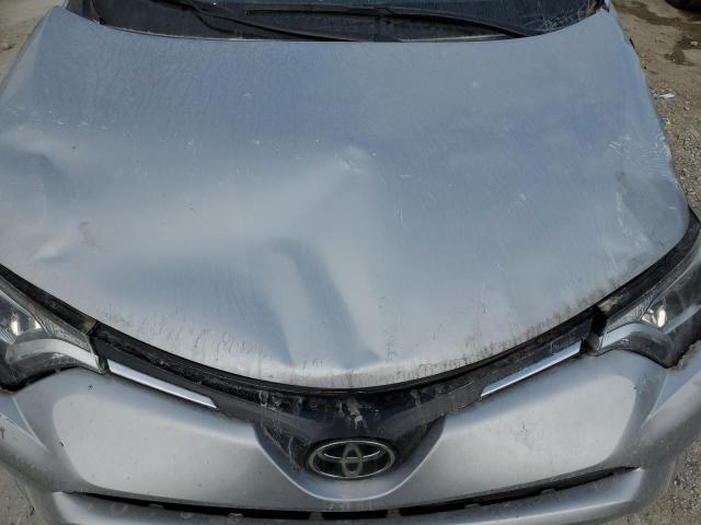 2T3ZFREV4JW436944 - 2018 TOYOTA RAV4 LE SILVER photo 12