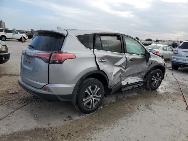 2T3ZFREV4JW436944 - 2018 TOYOTA RAV4 LE SILVER photo 3