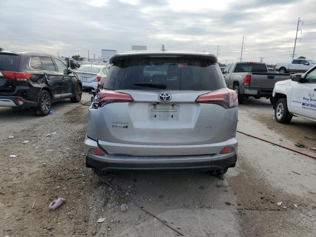 2T3ZFREV4JW436944 - 2018 TOYOTA RAV4 LE SILVER photo 6