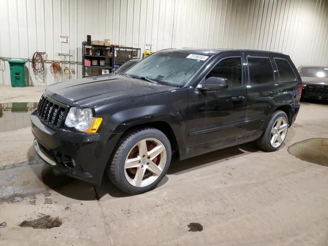 1J4RR7GW1AC157854 - 2010 JEEP GRAND CHER SRT-8 BLACK photo 1