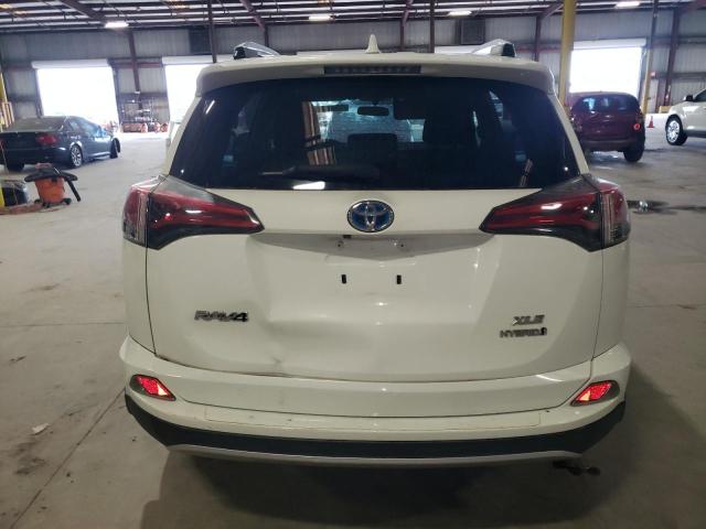 JTMRJREV0GD014920 - 2016 TOYOTA RAV4 HV XLE WHITE photo 6