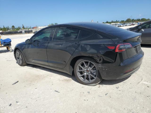 5YJ3E1EA4PF586607 - 2023 TESLA MODEL 3 BLACK photo 2