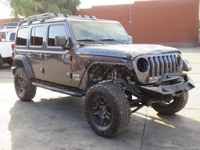 1C4HJXDG3JW272377 - 2018 JEEP WRANGLER U SPORT Сірий фото 1