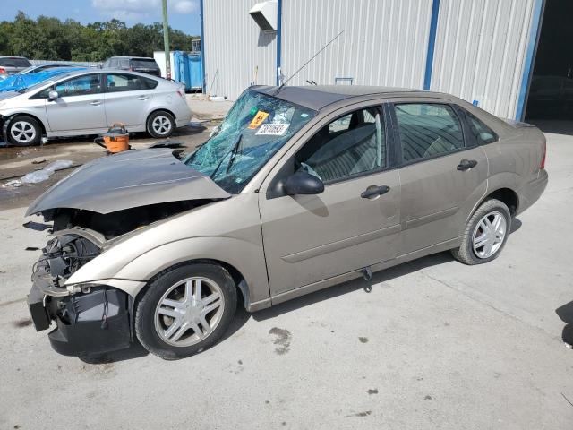 1FAFP34Z93W285773 - 2003 FORD FOCUS SE COMFORT TAN photo 1