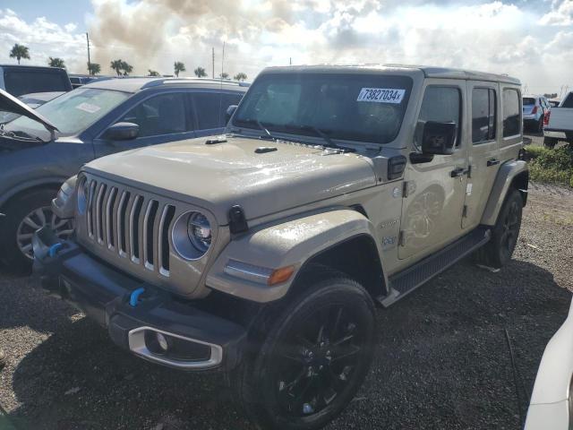 1C4JJXP69NW279845 - 2022 JEEP WRANGLER U SAHARA 4XE TAN photo 1