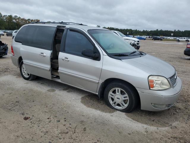 2FMZA522X4BA23897 - 2004 FORD FREESTAR SEL SILVER photo 4