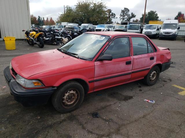 1NXAE94A9LZ090979 - 1990 TOYOTA COROLLA DLX RED photo 1