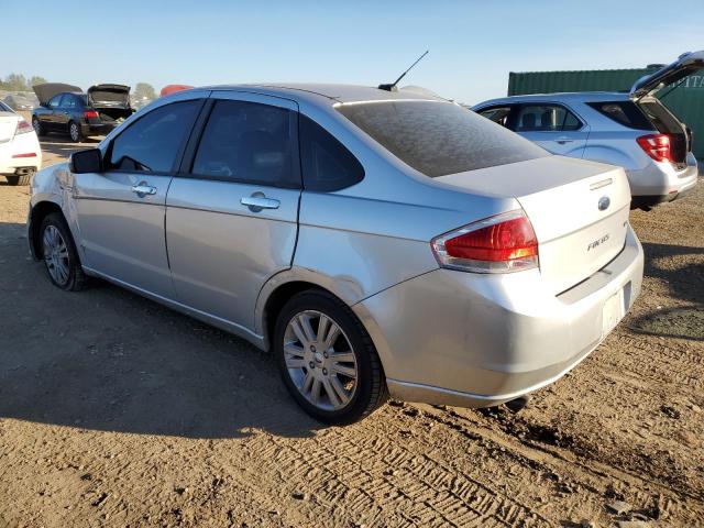 1FAHP3HNXAW231587 - 2010 FORD FOCUS SEL SILVER photo 2