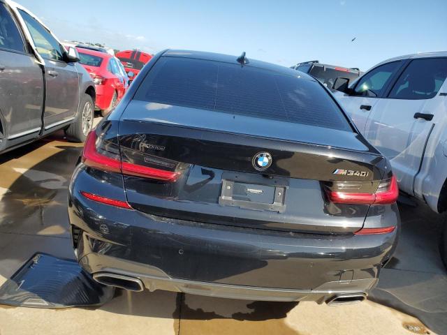 3MW5U9J08M8B97246 - 2021 BMW M340XI BLACK photo 6