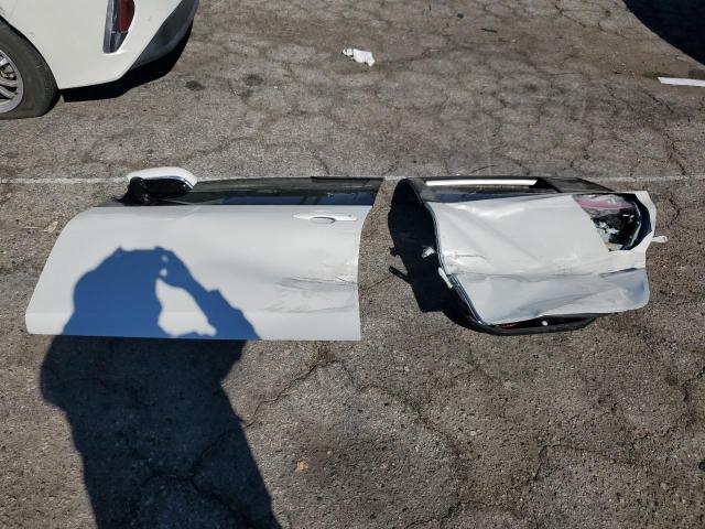 JTDKARFP6K3113628 - 2019 TOYOTA PRIUS PRIM WHITE photo 12