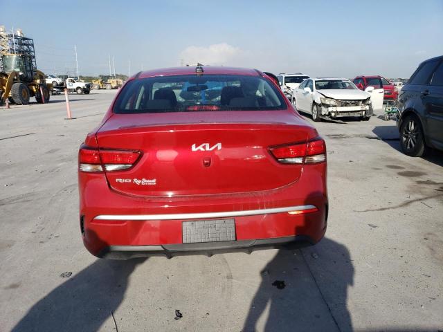 3KPA24AD7PE529129 - 2023 KIA RIO LX RED photo 6