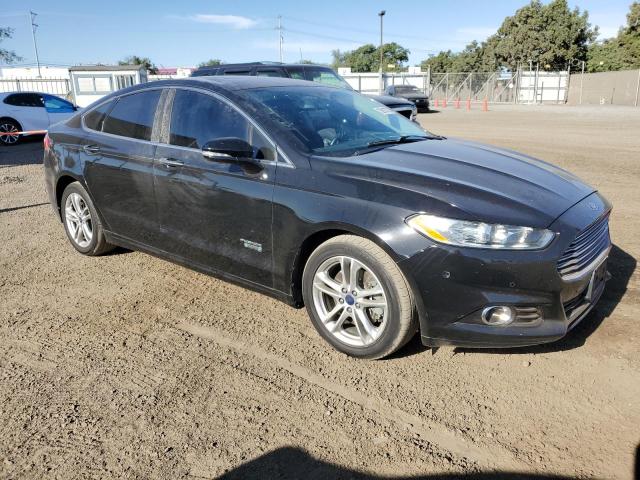 3FA6P0SU7GR320809 - 2016 FORD FUSION TITANIUM PHEV BLACK photo 4