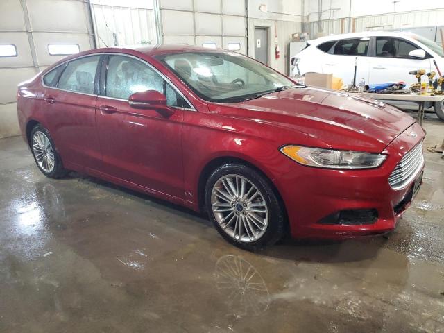 3FA6P0HD7FR293665 - 2015 FORD FUSION SE MAROON photo 4