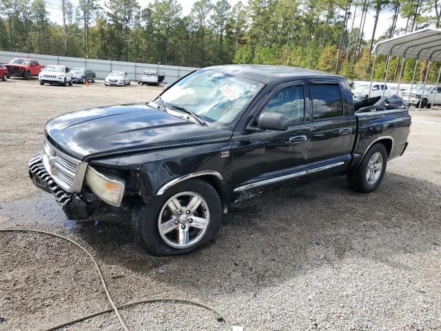 1D7RW5GPXBS589559 - 2011 DODGE DAKOTA LARAMIE BLACK photo 1