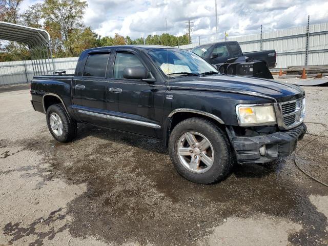 1D7RW5GPXBS589559 - 2011 DODGE DAKOTA LARAMIE BLACK photo 4