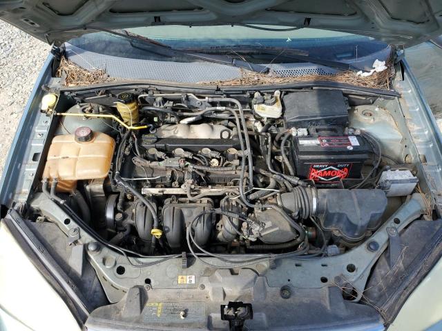 1FAFP34N75W155510 - 2005 FORD FOCUS ZX4 GREEN photo 11