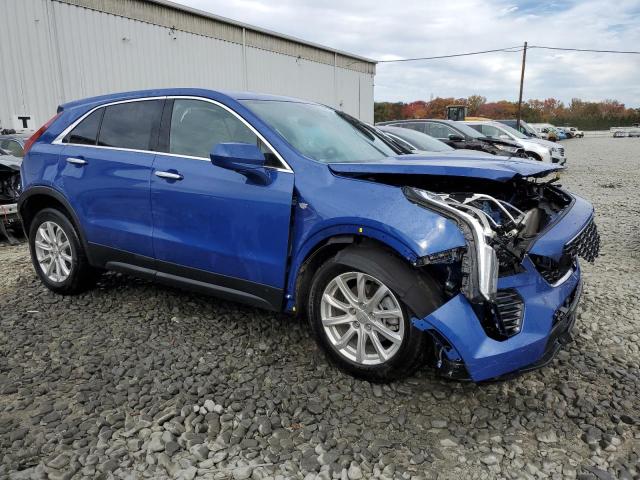 1GYFZBR42PF112401 - 2023 CADILLAC XT4 LUXURY BLUE photo 4