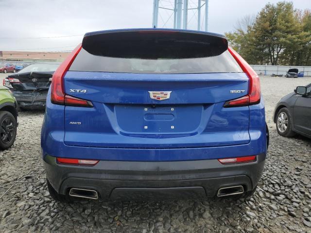 1GYFZBR42PF112401 - 2023 CADILLAC XT4 LUXURY BLUE photo 6