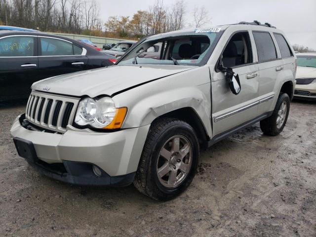 1J4PR4GKXAC129778 - 2010 JEEP GRAND CHER LAREDO BEIGE photo 1