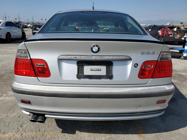 WBAAM5339YJR55779 - 2000 BMW 328 I SILVER photo 6