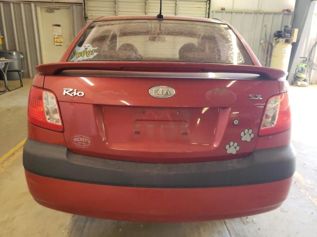 KNADE223196476268 - 2009 KIA RIO BASE ORANGE photo 6