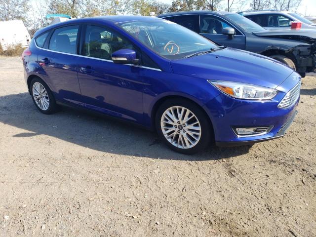 1FADP3N24FL354772 - 2015 FORD FOCUS TITANIUM BLUE photo 4