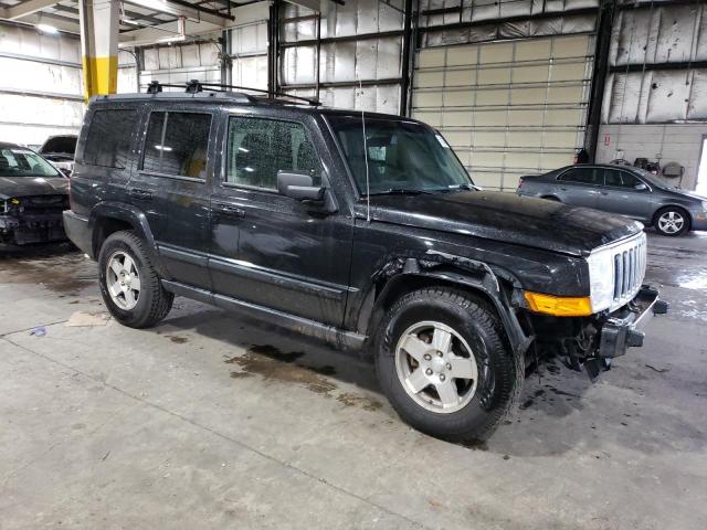 1J8HG48K99C501100 - 2009 JEEP COMMANDER SPORT BLACK photo 4